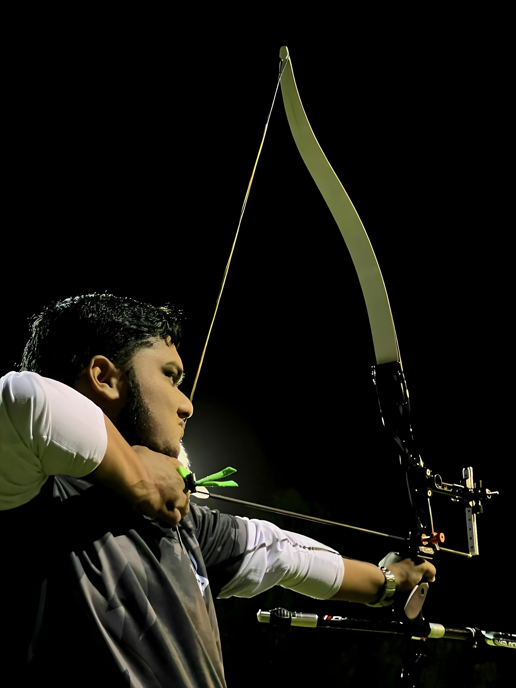 Abdullah Mohamed — Full draw at night